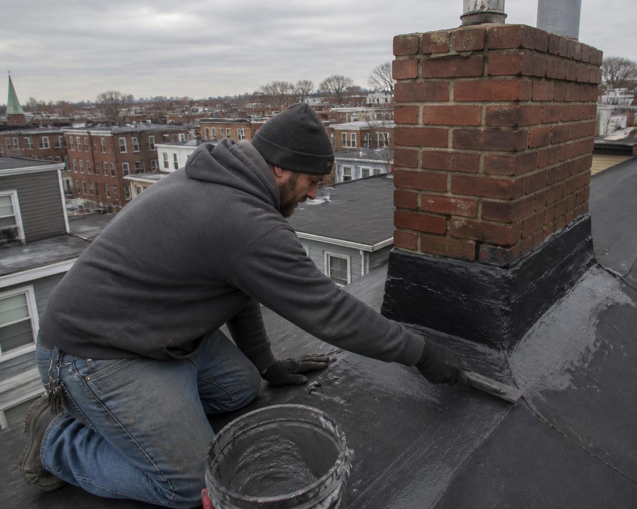 Always On Top Roofing crew working on a home in Roxbury, MA