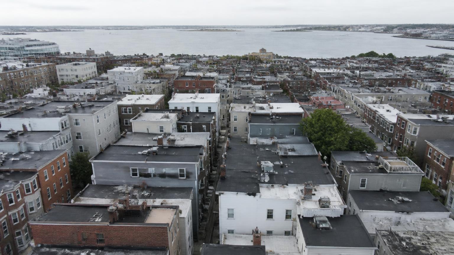 Aerial view of South Boston, Massachusetts rooftops and harbor