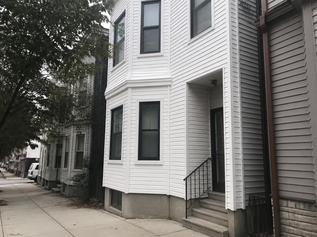 Rowhouse siding replacement — South Boston, MA